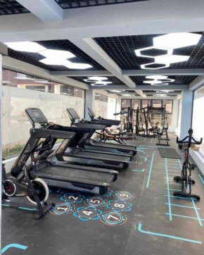 The elegant cozy apartment with amazing city views,heated swimming pool, well equipped gym, child play area and free parking space